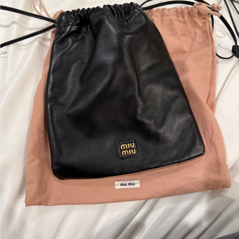Miu Miu Black Leather Pouch
Excellent condition